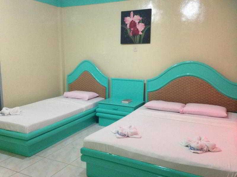 Queen\'S Beach Resort Manoc-Manoc 外观 照片